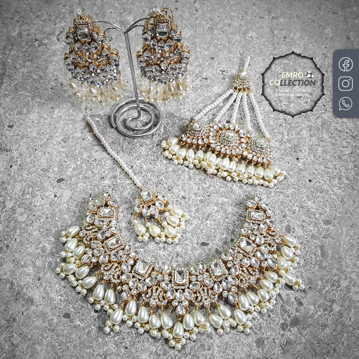 handcrafted bright golden necklace set with cream pearls, earrings, jhoomar, and tikka, perfect for parties and festive occasions.