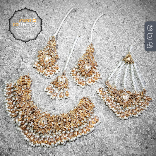 Champagne Pakistani necklace set with matching earrings, jhoomar, and tikka, perfect for parties and festive occasions