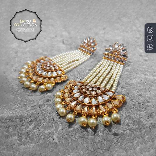 Elegant golden long earrings, perfect for parties and weddings, a stunning addition to any wedding jewelry collection.