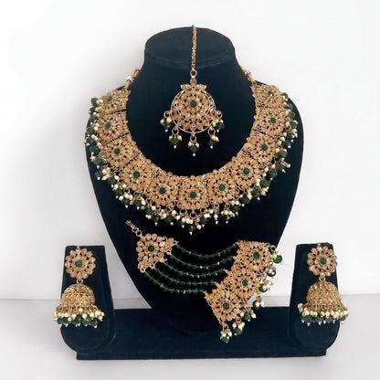 Handcrafted green necklace set with earrings, tikka, and jhoomar, perfect for Indian party wear and festive occasions
