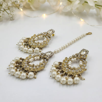 Golden and white pearls earrings maang tikka set