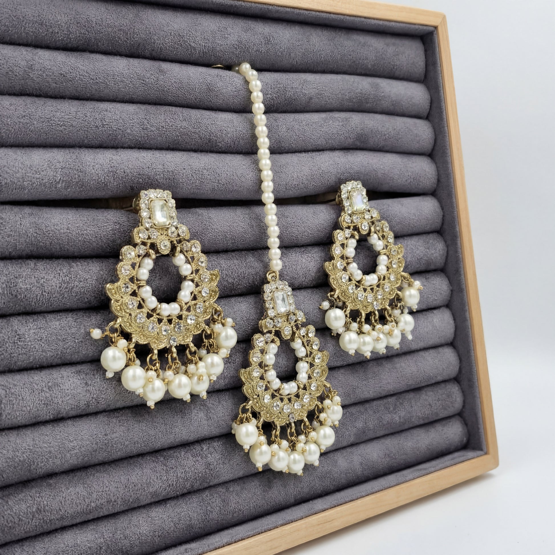 Golden and white pearls earrings maang tikka set