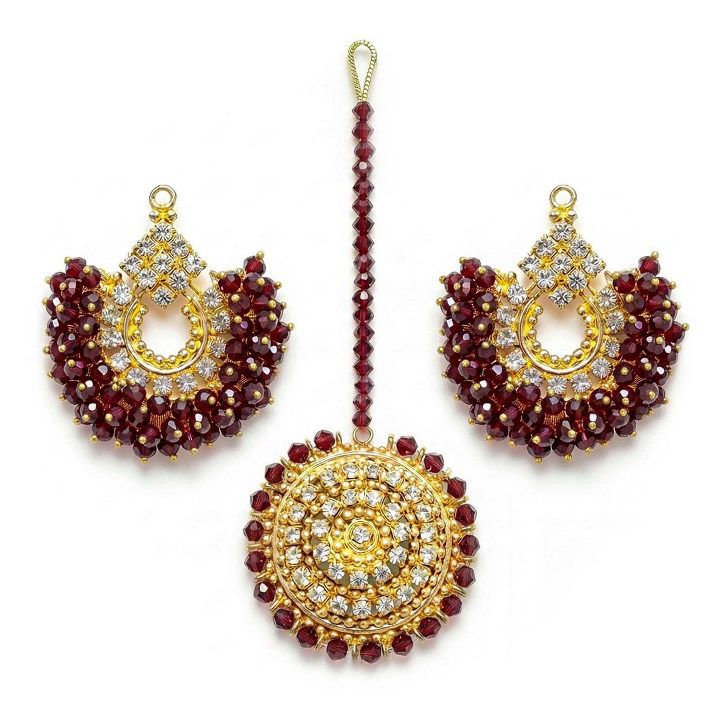 maroon chand bali earrings and maang tikka on a white background - trending pakistani jewellery