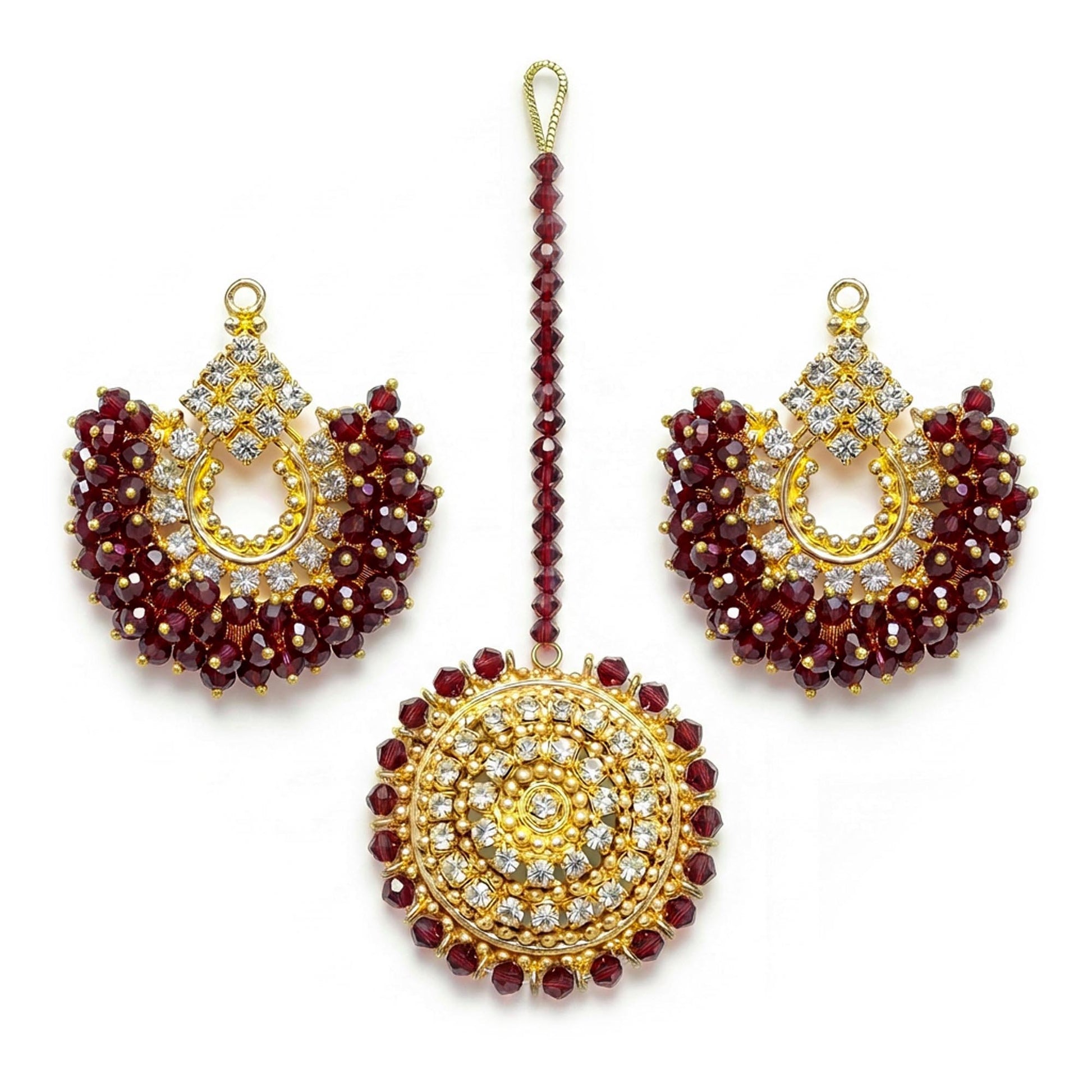 maroon chand bali earrings and maang tikka on a white background - trending pakistani jewellery