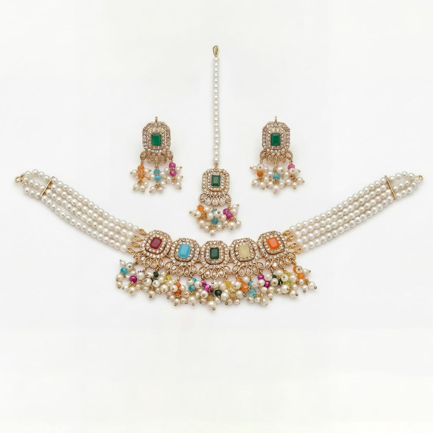 the full set — choker, earrings, and maang tikka — worn together on a mannequin bust for scale