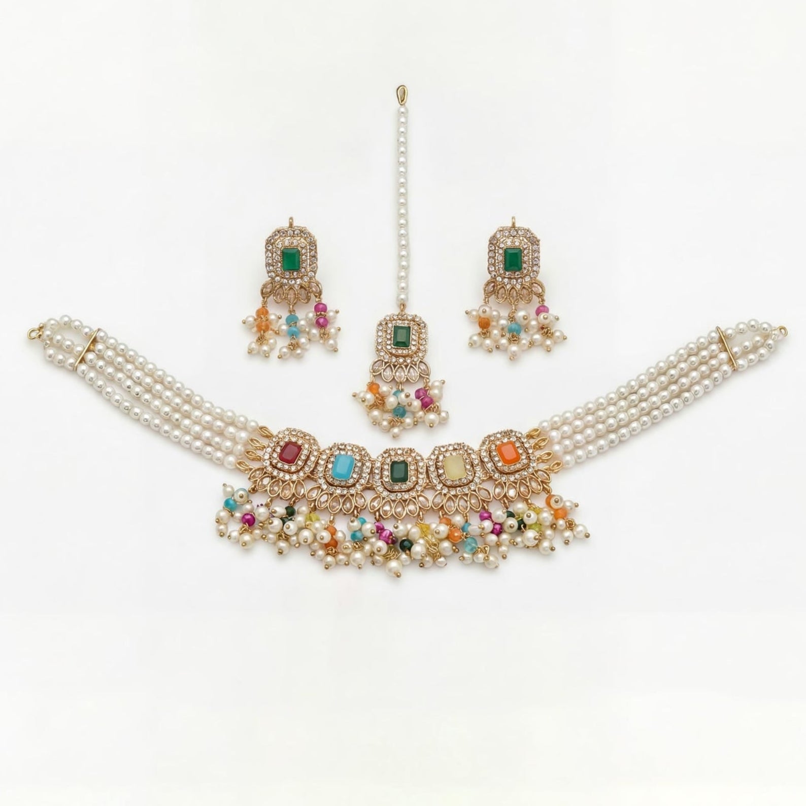 The full set — choker, earrings, and maang tikka — worn together on a mannequin bust for scale