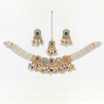 The full set — choker, earrings, and maang tikka — worn together on a mannequin bust for scale