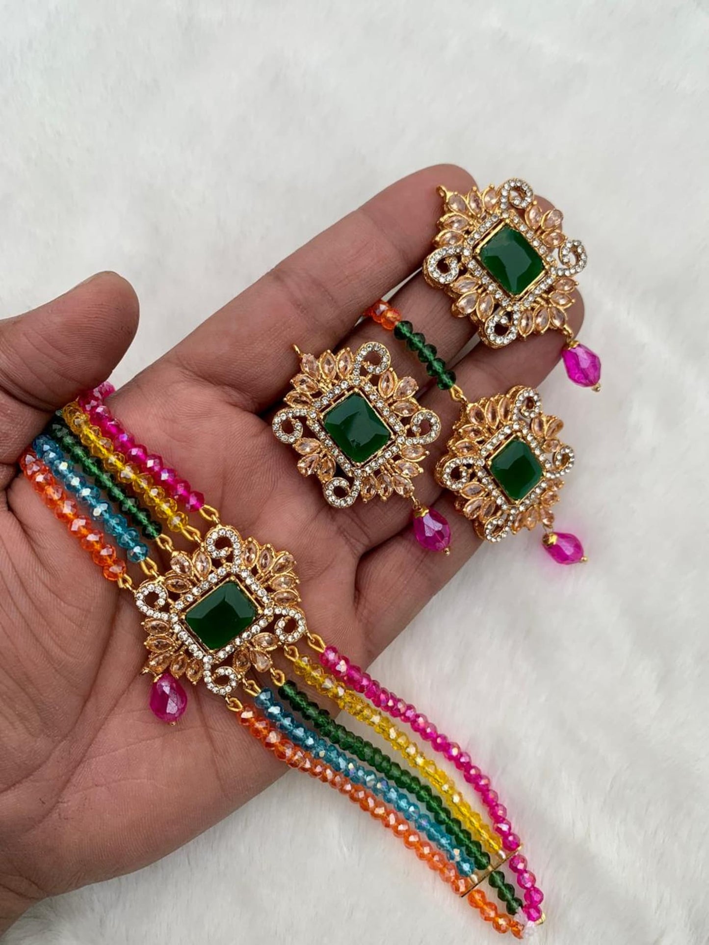 this multi choker set styled elegantly on a mannequin, fully ready for a mehndi function outfit