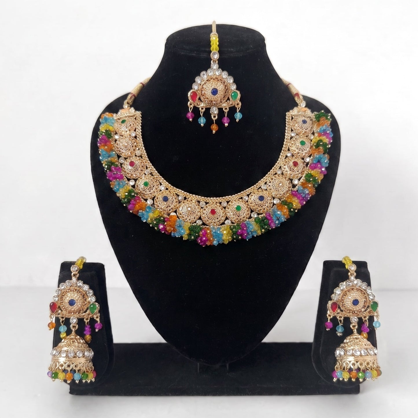 multi necklace set with matching earrings and tikka, crafted as high-quality pakistani mehndi jewelry, ideal for parties and celebrations