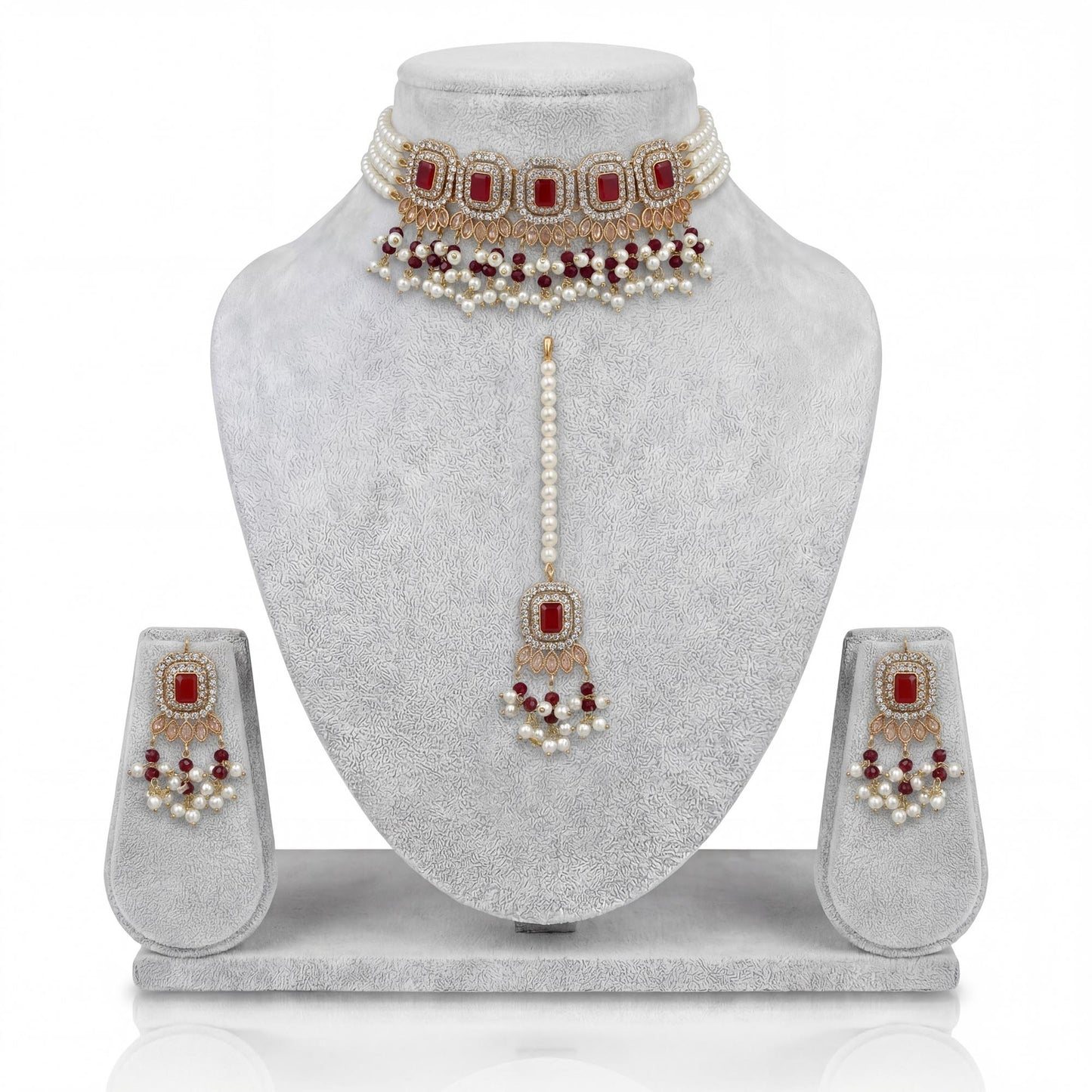 pakistani simple maroon choker set with earrings and maang tikka display indian jewellery