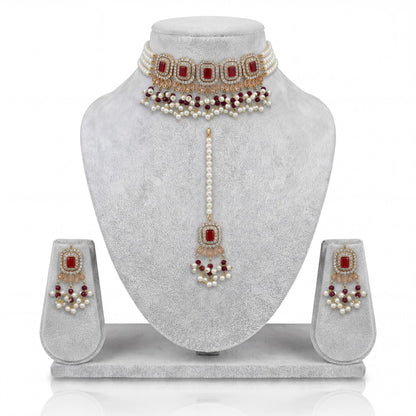 Pakistani simple maroon choker set with earrings and maang tikka display indian jewellery