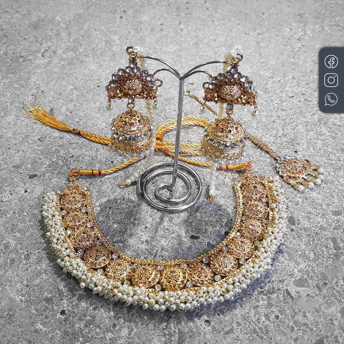 Off-white pearls necklace set exemplifies traditional Pakistani jewelry
