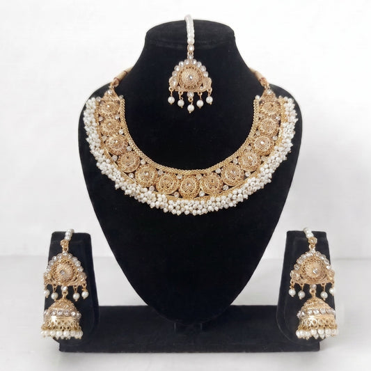 Off-white pearls necklace set exemplifies traditional Pakistani jewelry