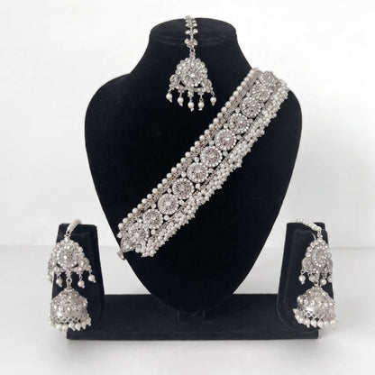 Explore the Silver Choker Set – a luxurious Indian choker necklace with earrings and tikka, perfect bridal jewelry for weddings and events.