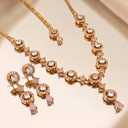 A detailed close-up of the baby pink necklace, showing its fine craftsmanship and gentle shine