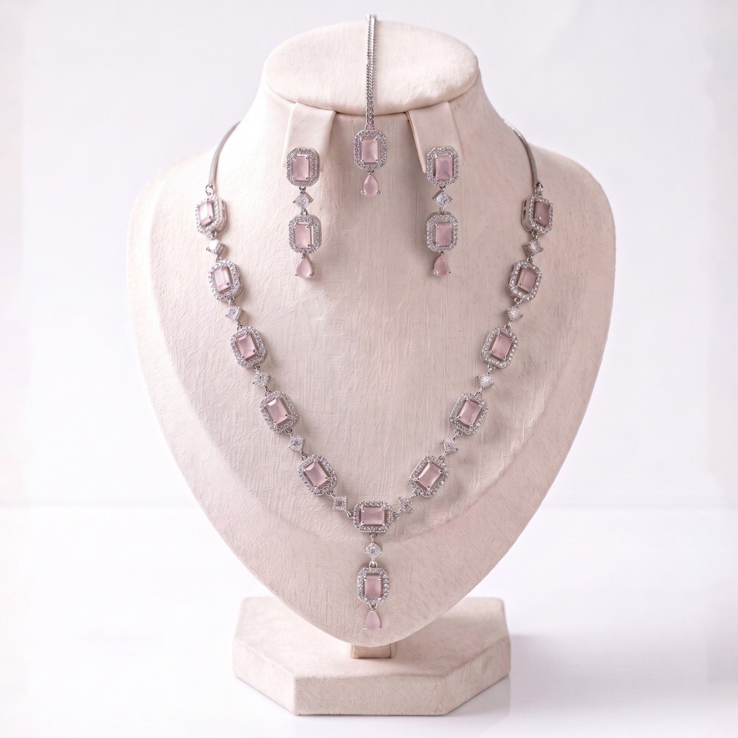 Simple Baby Pink Necklace Set with Earrings and Tikka displayed together showing soft detailing