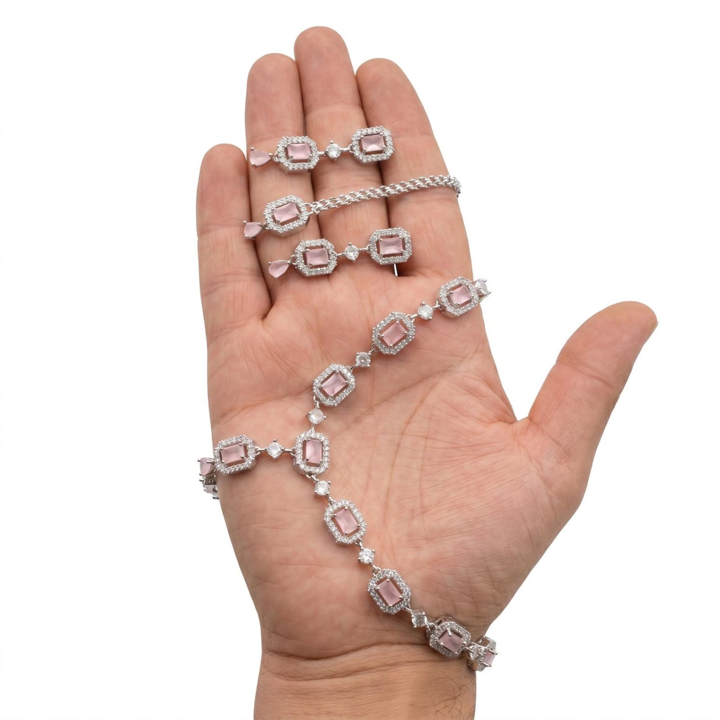 close-up of the baby pink necklace highlighting delicate craftsmanship and polished finish