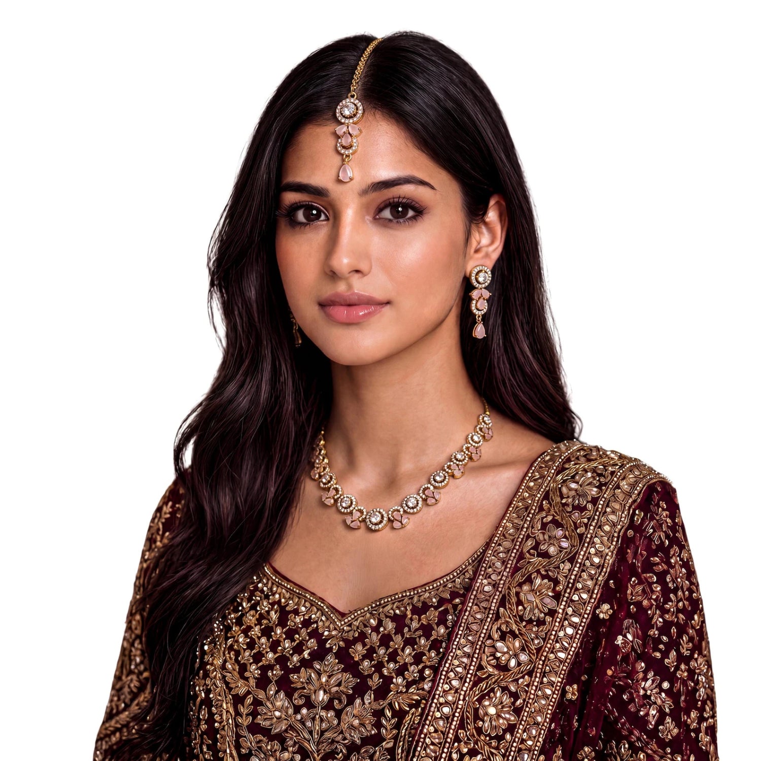 This gold and baby pink necklace set styled on a mannequin, dressed for a wedding or party look