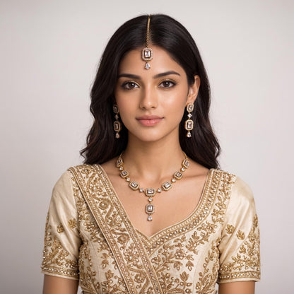 This gold and white necklace set styled on a mannequin, dressed for a wedding or festive occasion