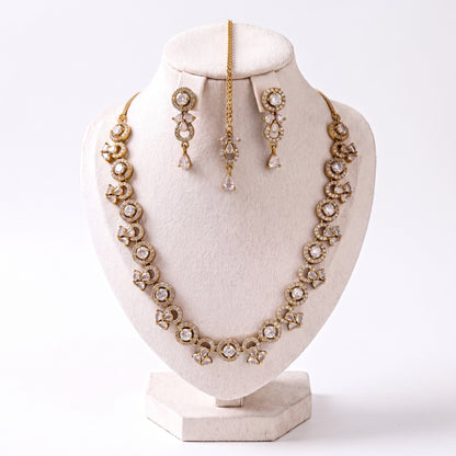 Simple Gold and White Necklace Set with Earrings and Tikka displayed together showing detailing