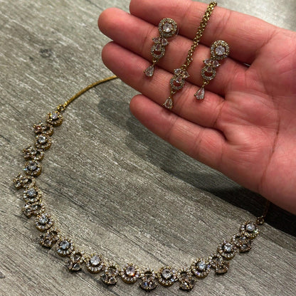Close-up of the Gold and White Necklace highlighting delicate craftsmanship and polished finish