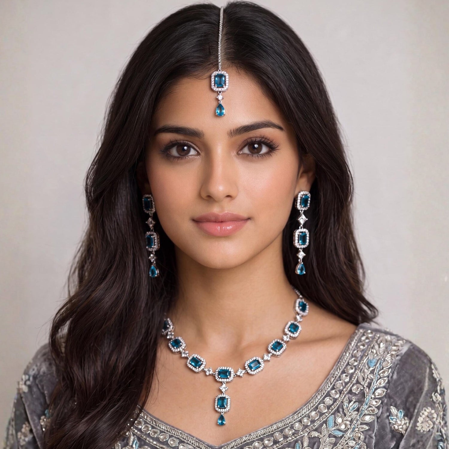 This Simple Light Blue Necklace Set styled on a mannequin, ready for a wedding or festive party