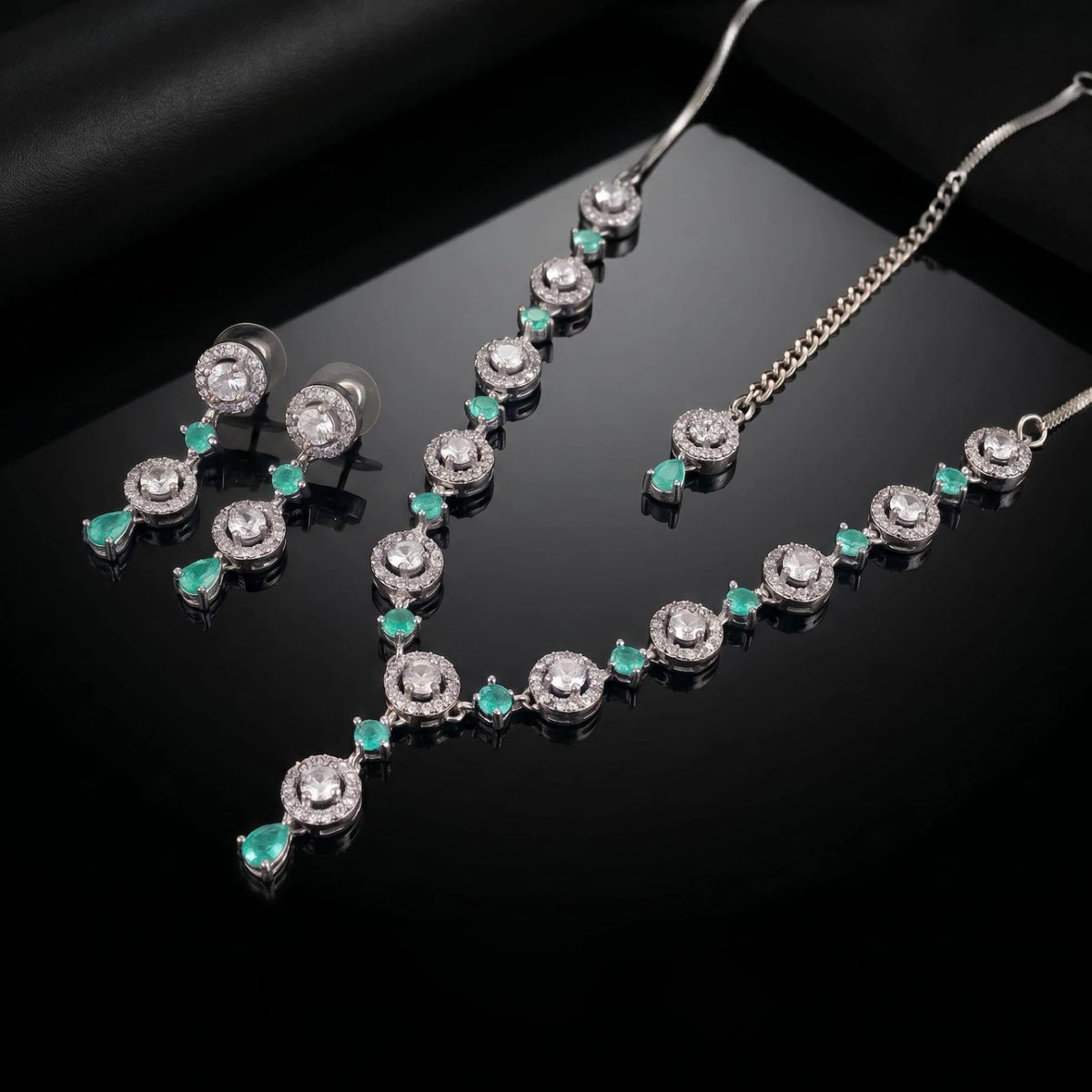 mint green necklace set styled elegantly on a mannequin for a wedding and party jewellery look