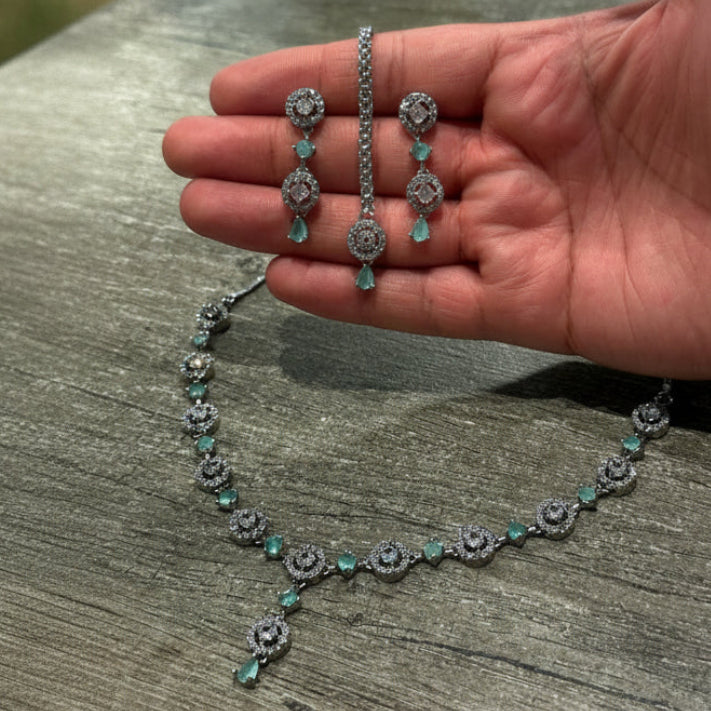 tikka set | wedding jewellery 2	close-up of the mint green necklace highlighting delicate craftsmanship and polished finish