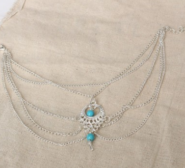 intricate bohemian anklets with silver chains and turquoise details, a must-have accessory for casual and beach outfits
