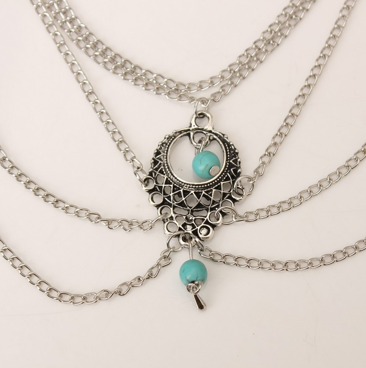 fashionable bohemian anklets with turquoise detailing, ideal for beachwear and casual outfits