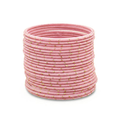 Model wearing baby pink bangles on wrist showing elegant slim stack in Pakistani bridal jewellery style indian jewellery