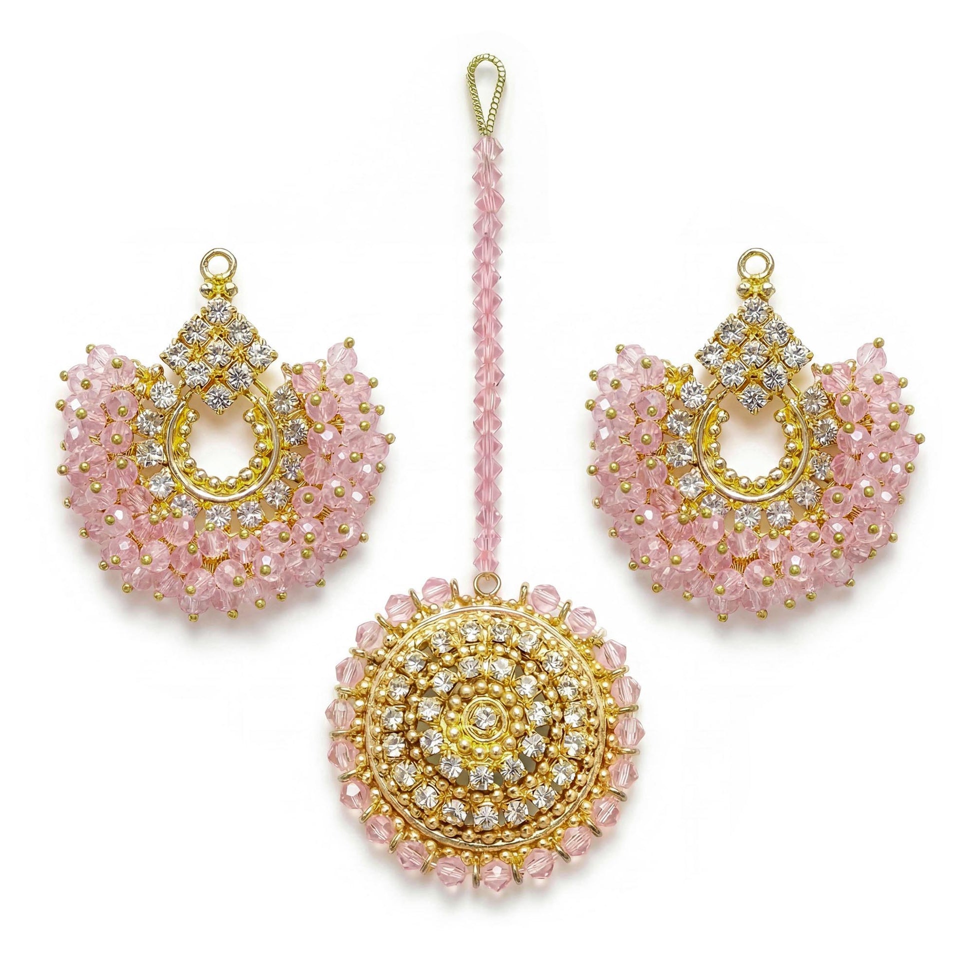 Baby pink chand bali earrings and maang tikka on a white background - trending pakistani jewellery