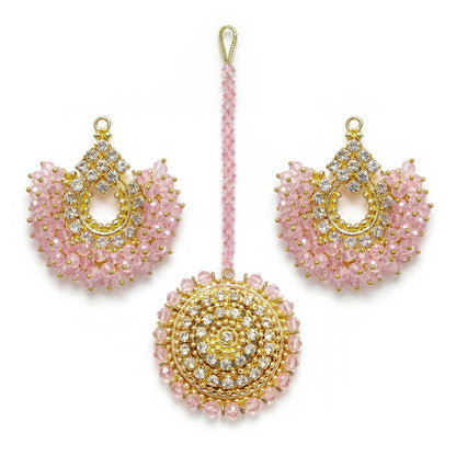 Baby pink chand bali earrings and maang tikka on a white background - trending pakistani jewellery