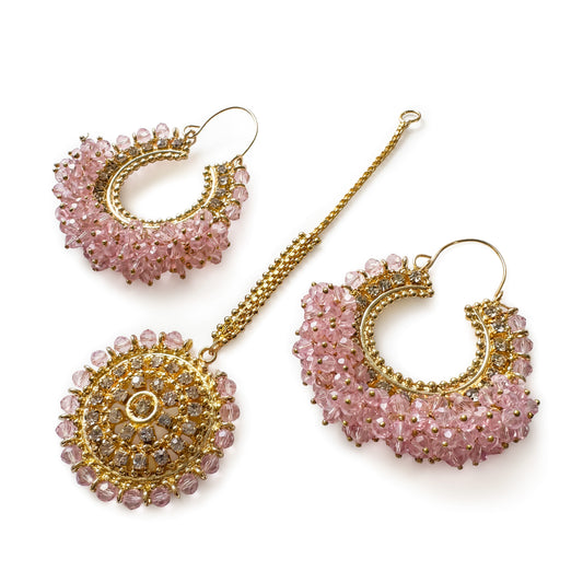 Baby Pink chand bali earrings and maang tikka set on a white background - Trending pakistani jewellery. 
