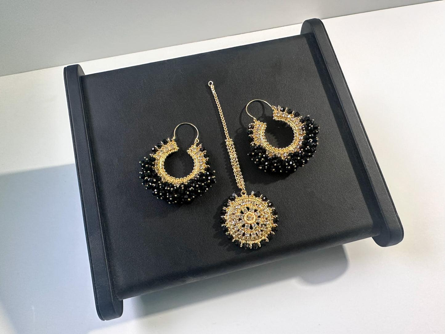 traditional black chand bali earrings and maang tikka. trending pakistani jewellery