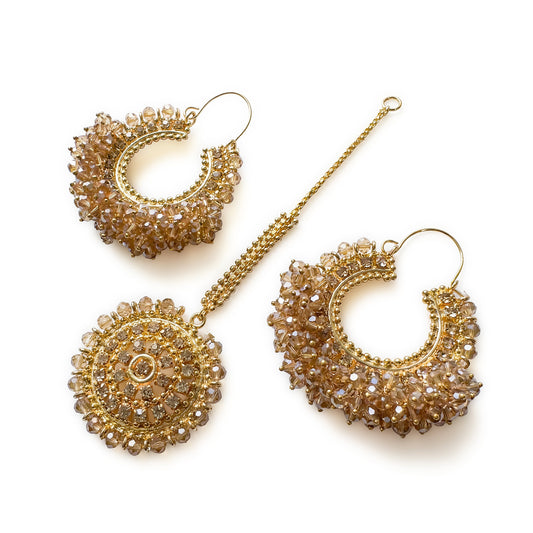 Champagne chand bali earrings with matching maang tikka in trending Pakistani traditional jewelry style, featuring intricate design and elegant finish.