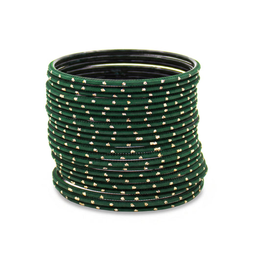 Close-up of dark green bangles with golden dots stack highlighting polished finish and bridal Indian jewellery craftsmanship indian jewellery
