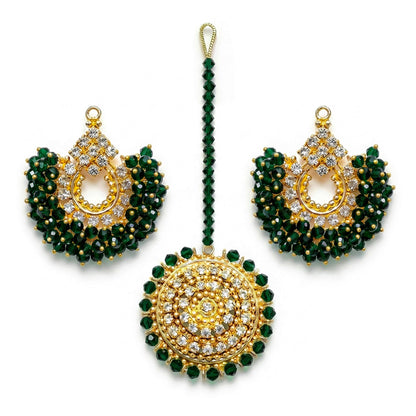 Dark green chand bali earrings and maang tikka on a white background - trending pakistani jewellery