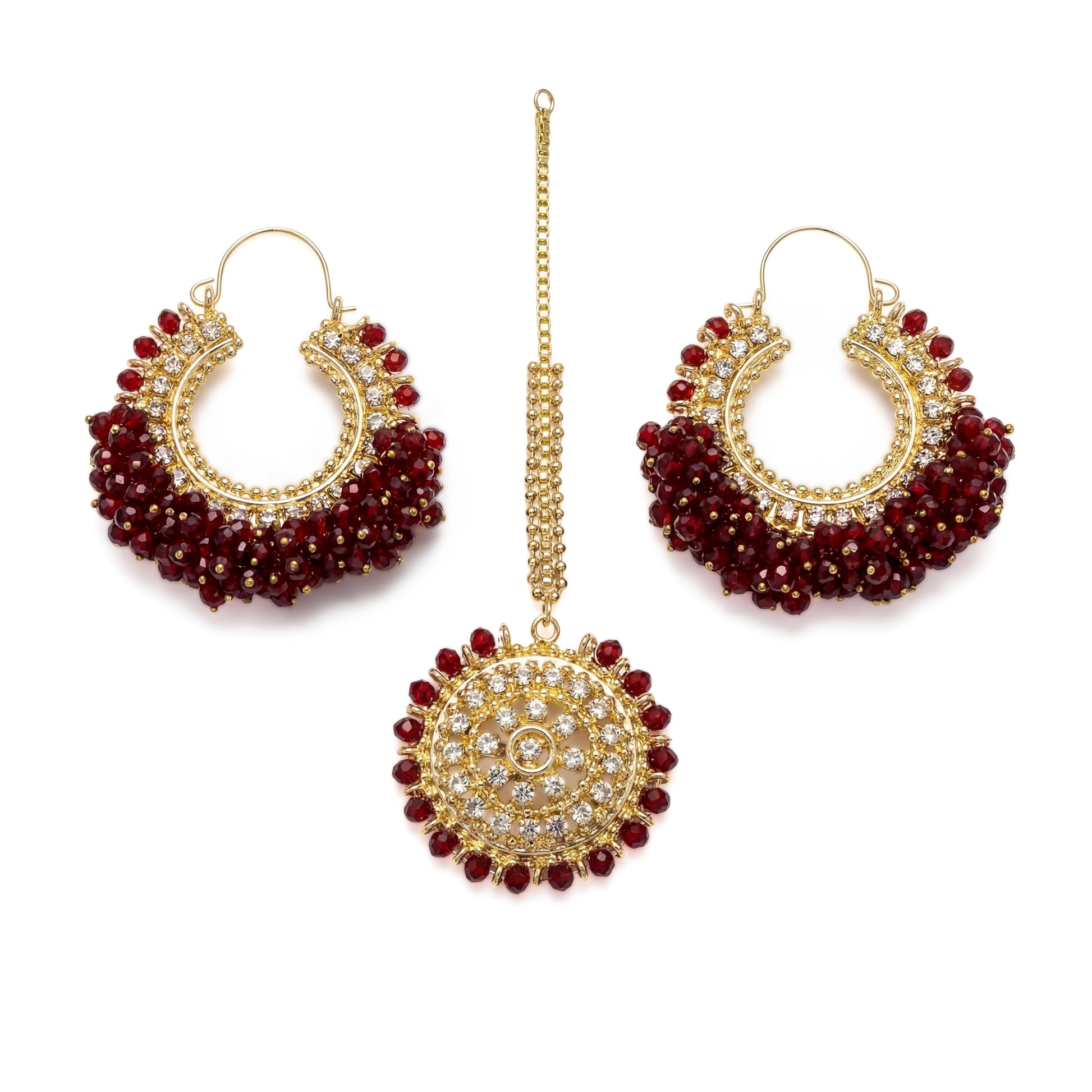Maroon chand bali earrings and maang tikka set on a white background - fron view - Trending pakistani jewellery. 