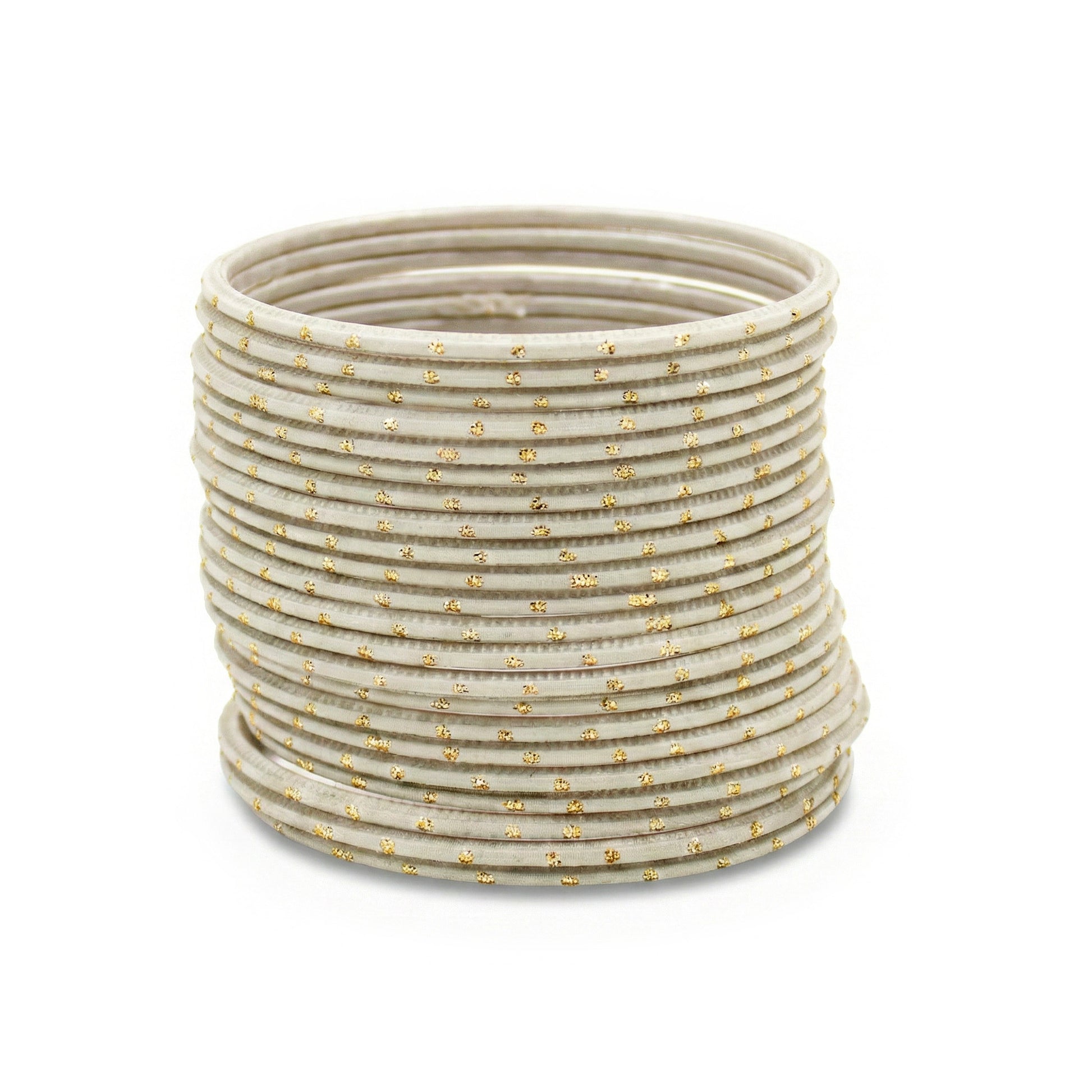 Close-up of off-white bangles with golden dots highlighting polished finish and refined Pakistani bridal jewellery craftsmanship indian jewellery