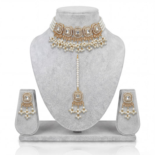 Off white pearl choker set displayed on light grey velvet dummy showing elegant pakistani jewellery craftsmanship