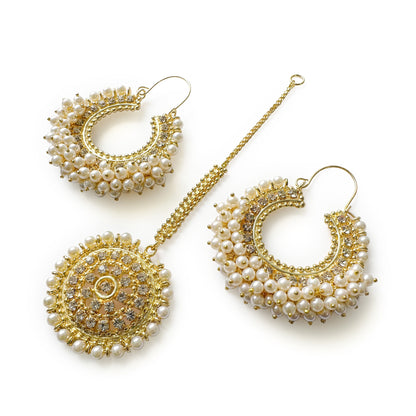 Pearl Chand Bali earrings with Maang Tikka on a white background. trending pakistani jewellery