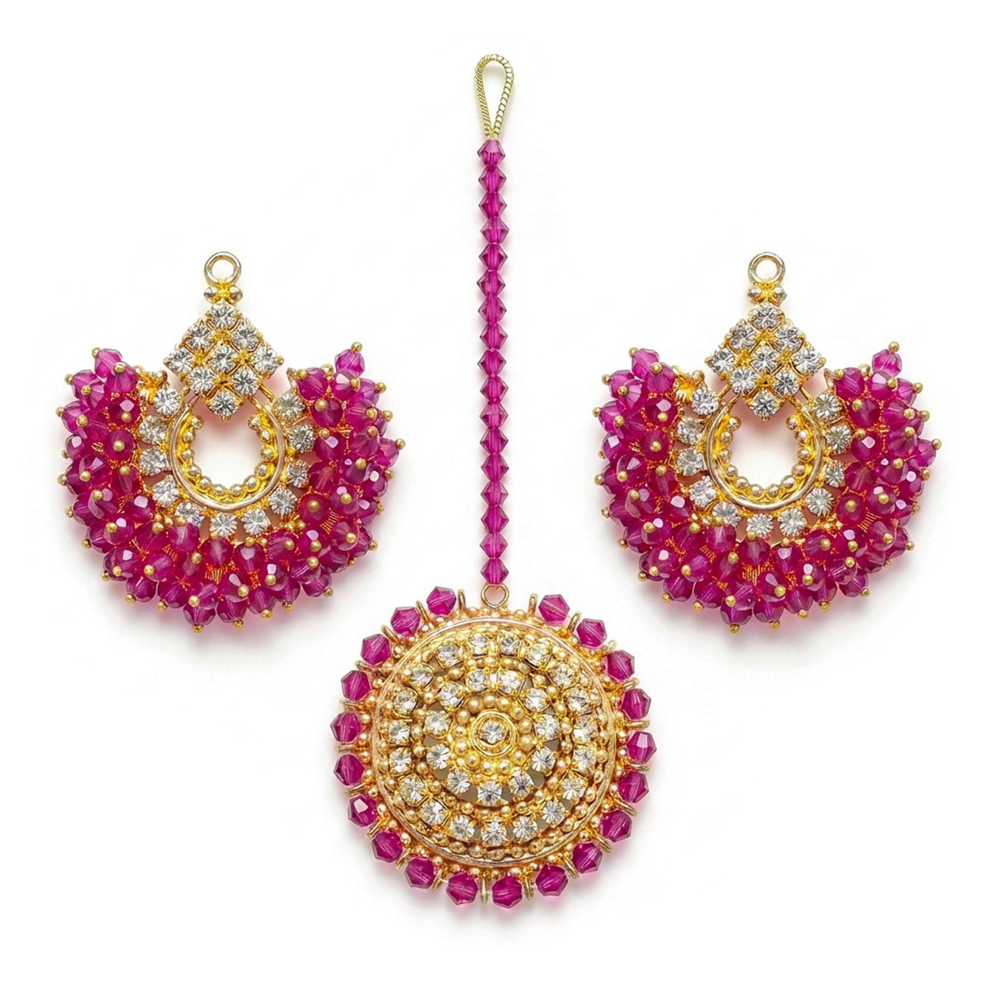 Shocking pink chand bali earrings and maang tikka on a white background - trending pakistani jewellery