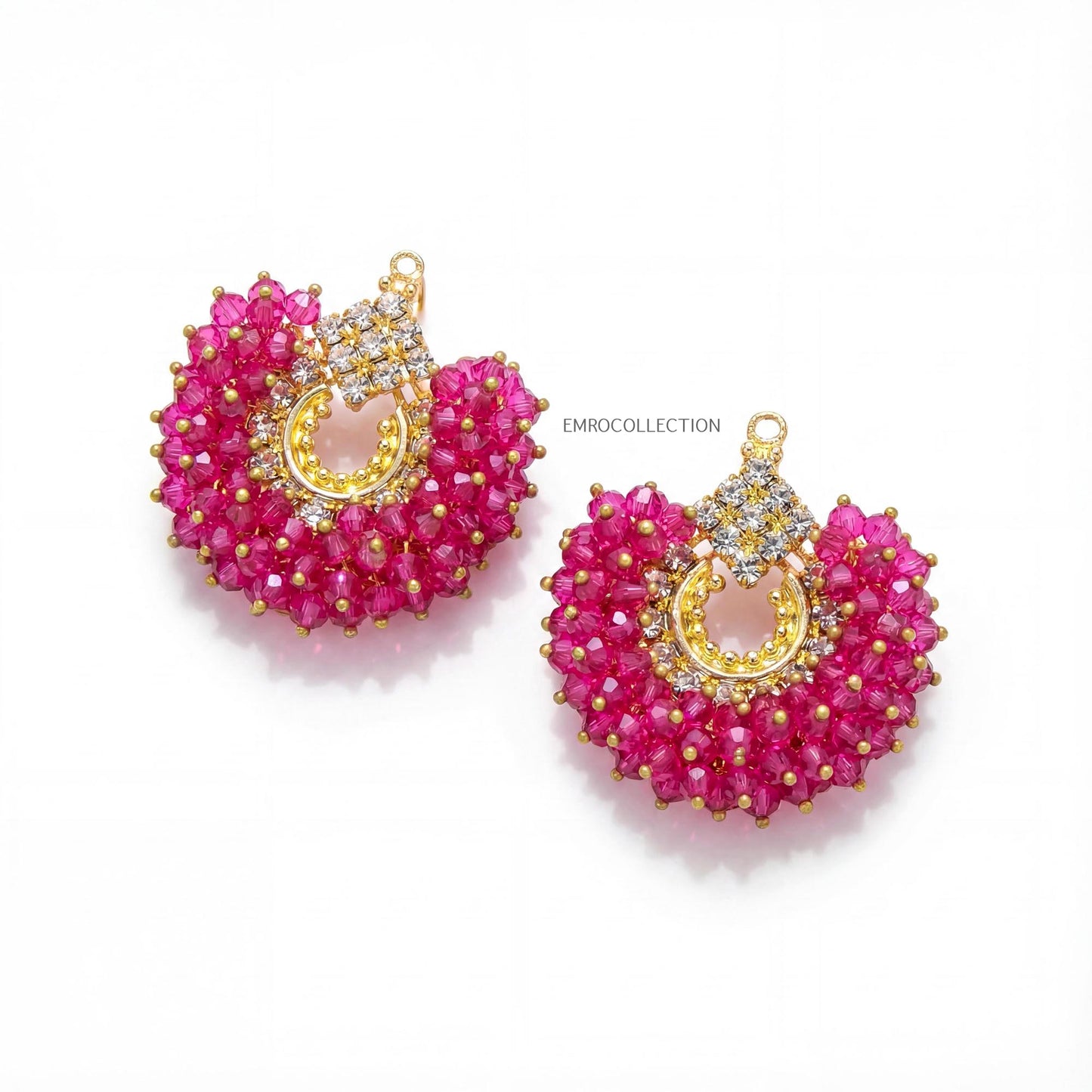 pair of shocking pink chand bali earrings with gold accents on a white background