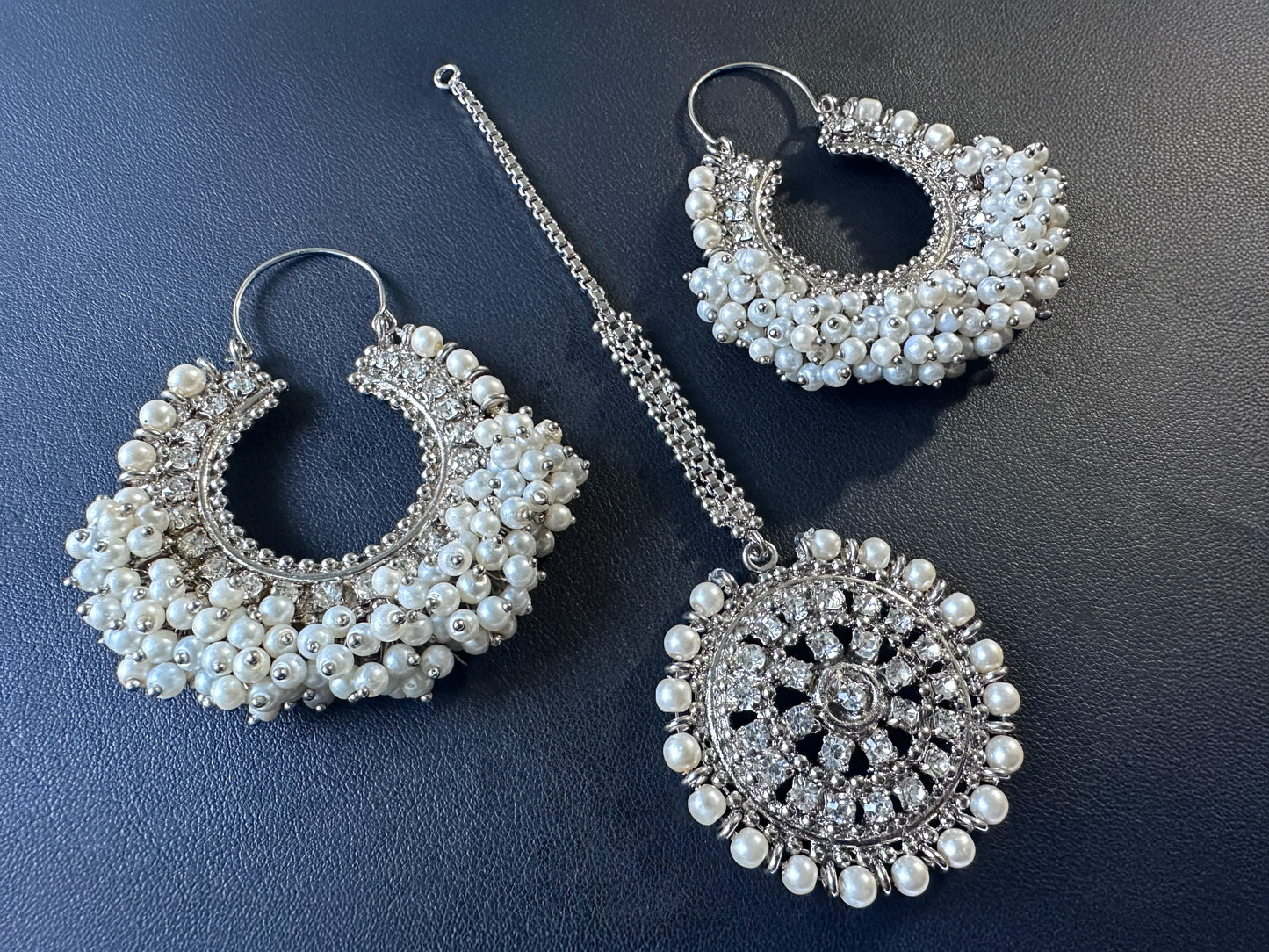 wedding wear silver white chand bali earrings and tikka. pakistani trending earrings tikka