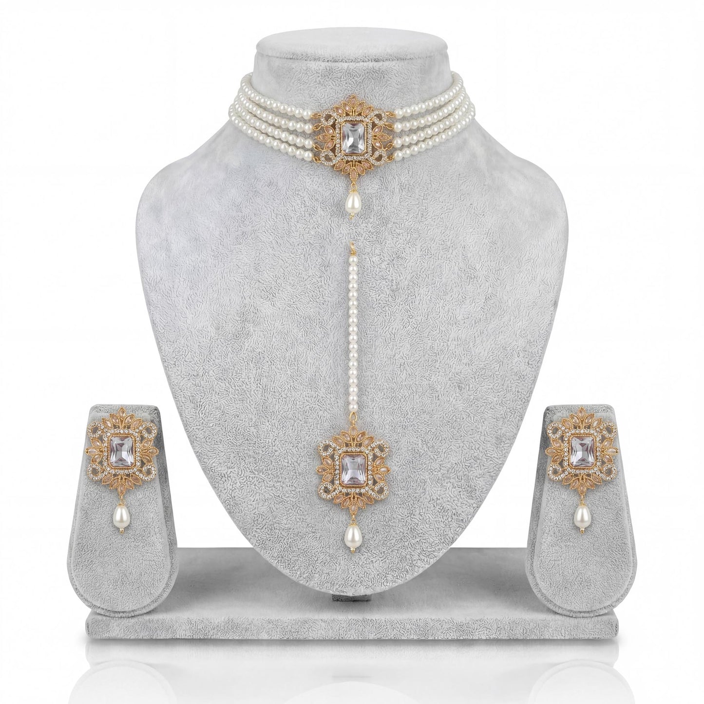 off white pearl choker set displayed on light grey velvet dummy showcasing elegant pakistani jewellery design