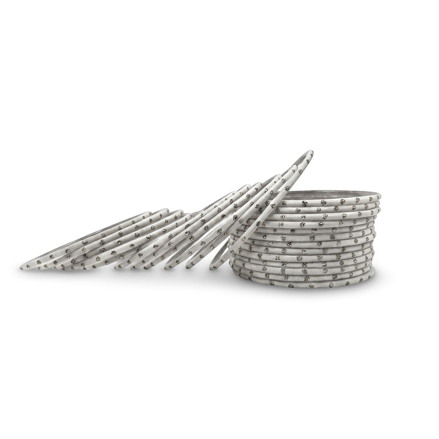 white bangles with silver dots churi set arranged together showing slim elegant indian jewellery design indian jewellery