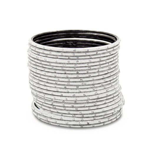 Close-up of white bangles with silver dots stack highlighting polished finish and bridal Indian jewellery craftsmanship indian jewellery