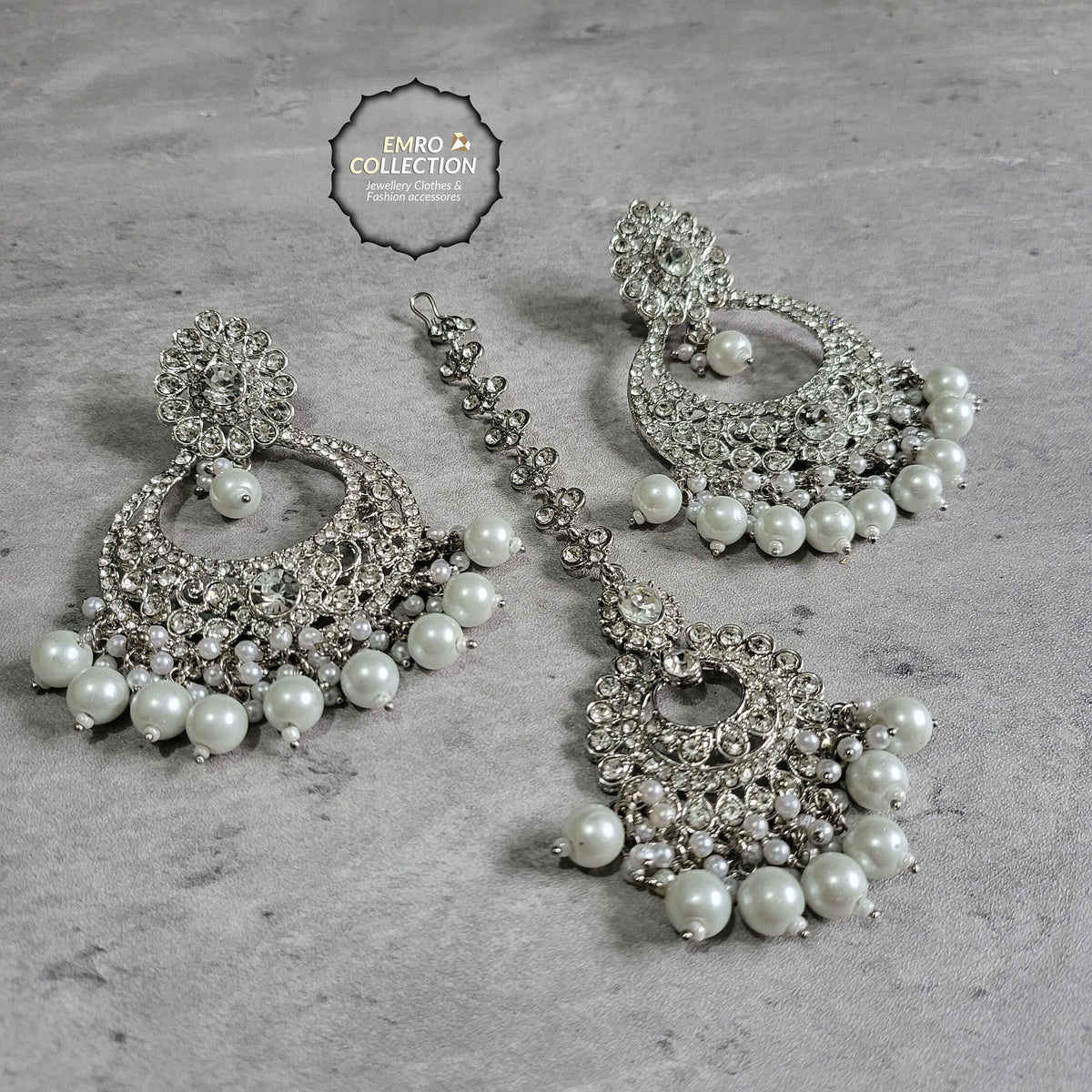 Silver Mang Tikka Set styled elegantly on a mannequin for a wedding jewelry look